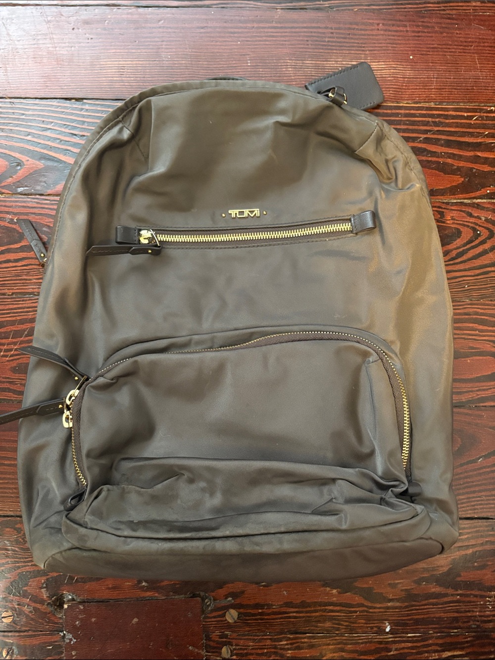 Pre- loved Tumi Black Nylon Backpack with Gold Hardware